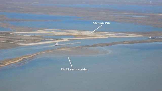 Aerial view of PA 63 showing a navigation channel, surrounding shallow water and marsh, and constructed land areas. Labels and arrows identify the PA 63 east corridor in the foreground and McInnis Pits beyond the channel.